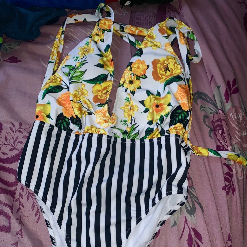 Very cute new bathing suit. Never used.